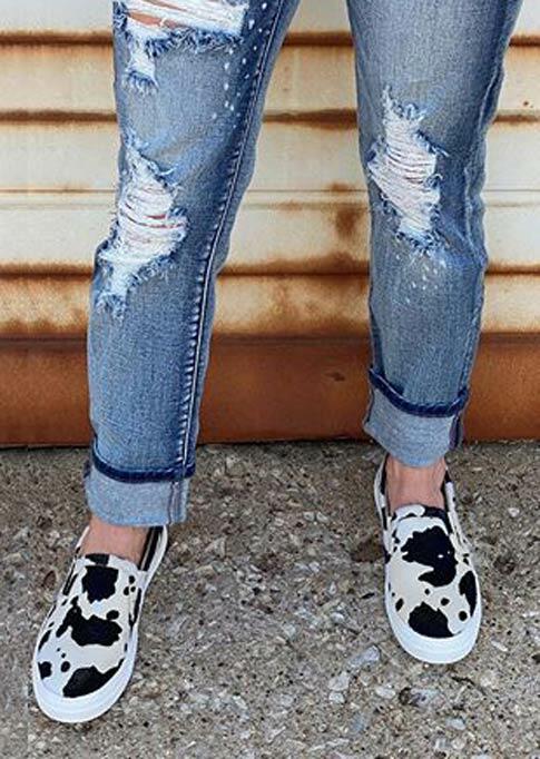 cow print slip on sneakers